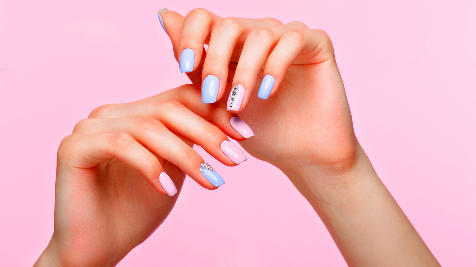 pink and blue manicure hands